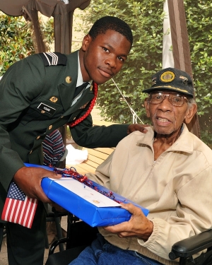 Cadet giving wish to a Veteran