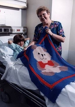 Delivering Blanket to Child at Loma Linda Hospital