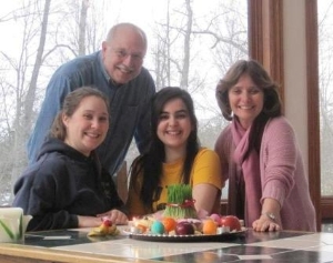Amina with her host family