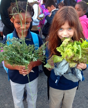 Students WIth Garden-Grown Vegetables