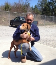 Our founder, Bryan, with a rescued dog