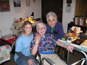 Volunteer visiting Elderly Couple