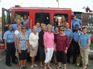 Volunteers Posing with Fire Truck