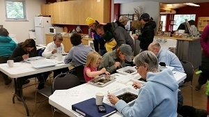 volunteers sorting macros at the center