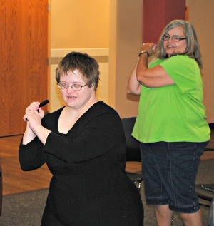 Clients enjoy exercising with volunteers.
