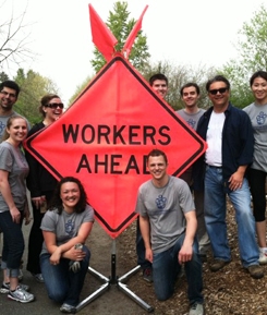 Mercer employee volunteers clean up a trail in Seattle.