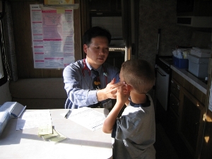 Volunteer Pediatrician with patient