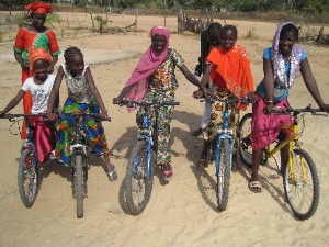 Gambian children - happy with new bikes
