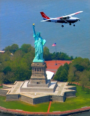 Cessna 182 over Statue of Liberty