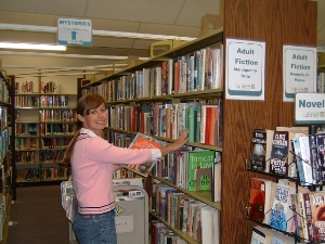 Shelving books at the Yreka Library