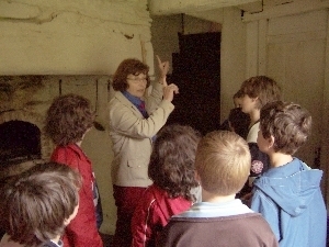 Leading a tour at Ogden House