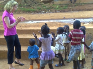 Volunteer "Christine" having fun with RWEYOWA kids