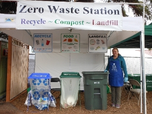A Volunteer helps educate on recycling!
