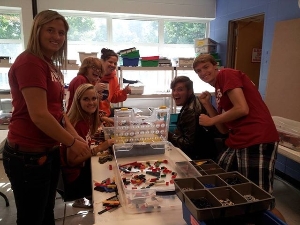 Volunteer LEGO sorters