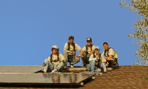SunWork Volunteers completing solar system