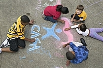 CASA kids with chalk