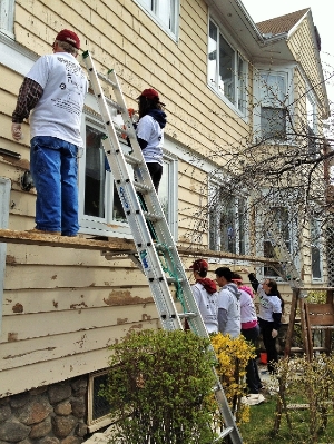 Volunteers paint Worcester home
